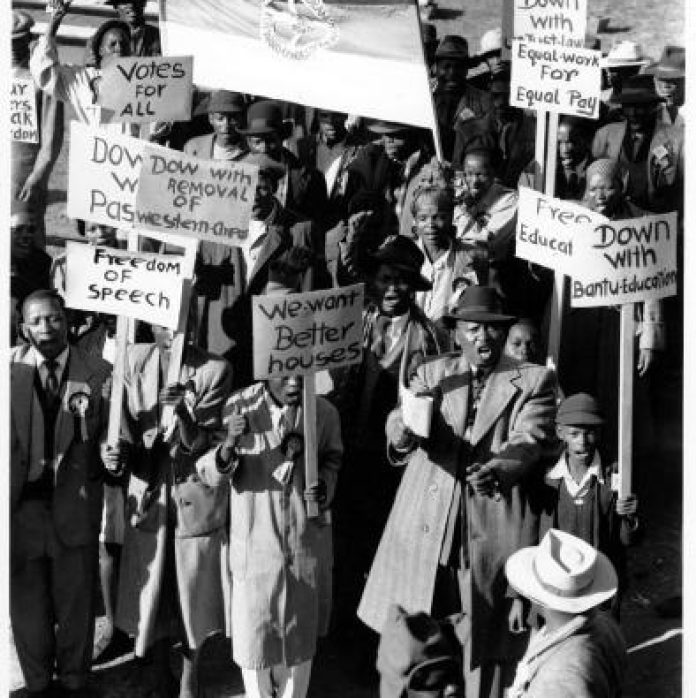 Supporters with placards at Congress of the People, Kliptown.
